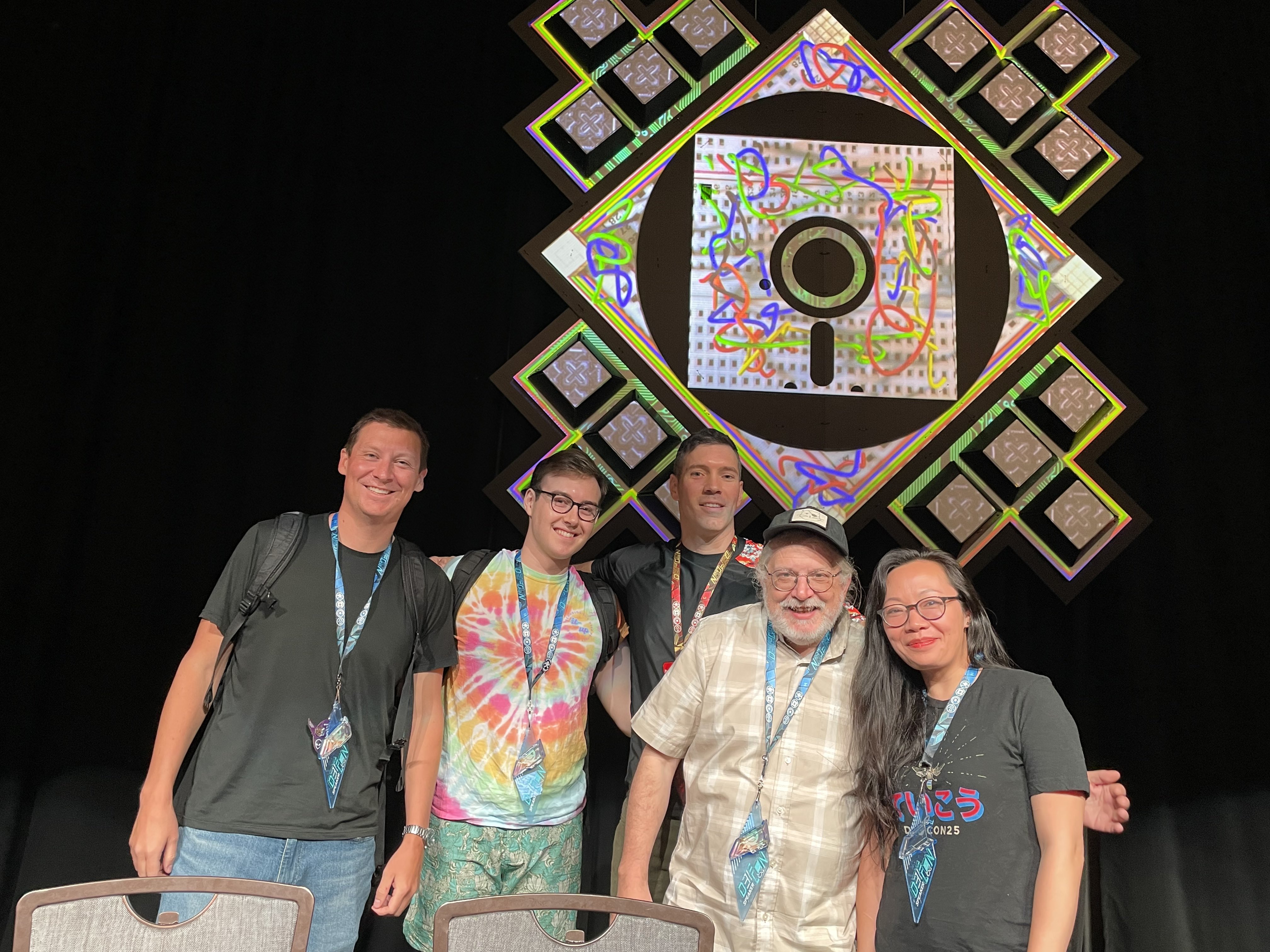 A photo of us after the talk. From left to right: Charley Snyder (Google), me, Harley Geiger (Venable), Kurt Opsahl (Filecoin Foundation), Hannah Zhao (EFF)